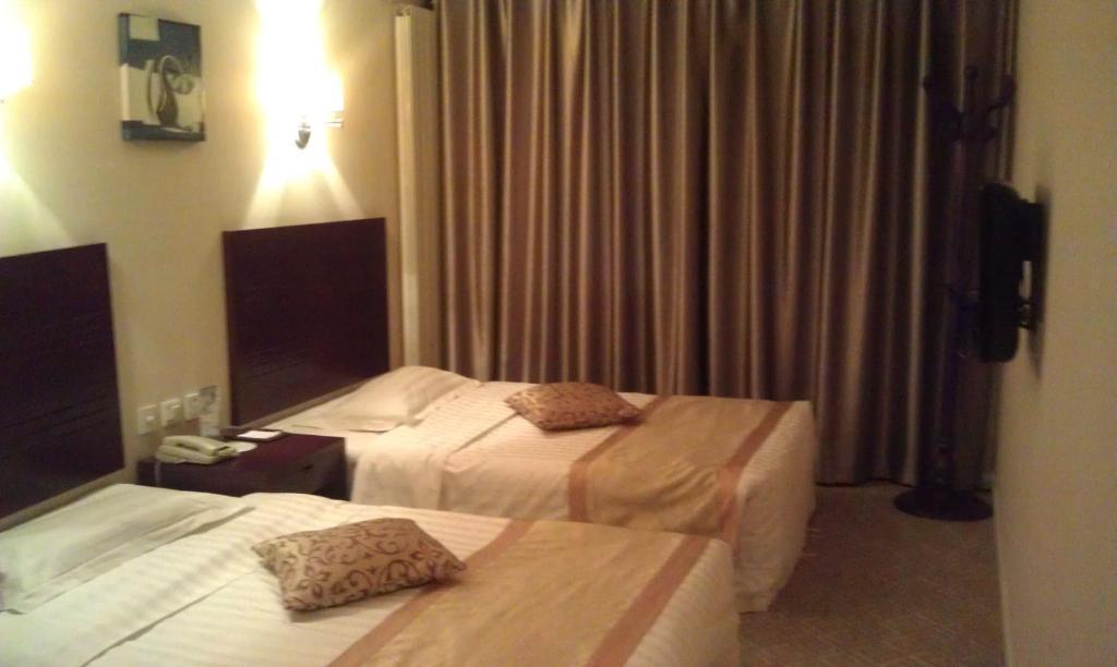 Dajiaoting International Business Hotel Pequim Quarto foto
